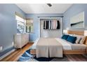Bright bedroom with walk-in closet and hardwood floors at 101 N Hill Ave # 4, Deland, FL 32724