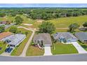 Property view showing house location in a golf course community at 21242 Braveheart Dr, Leesburg, FL 34748