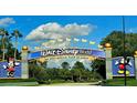 The entrance to Walt Disney World with Mickey and Minnie Mouse at 5639 Costa Blanca Way, Davenport, FL 33897
