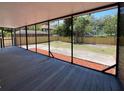 Spacious screened porch with backyard view at 608 N Summerlin Ave, Orlando, FL 32803