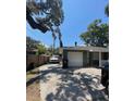 Green house with a one car garage and driveway at 608 N Summerlin Ave, Orlando, FL 32803