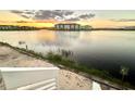 Scenic lake view at sunset from a lakeside community at 8125 Surf St, Kissimmee, FL 34747