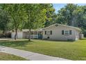 House exterior with two-car garage and front yard at 233 S 4Th St, Lake Mary, FL 32746