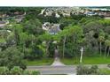 Spacious property with a house surrounded by lush greenery at 2341 Celery Ave, Sanford, FL 32771