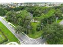 Large lot with a house at a corner location, offering visibility and access at 2341 Celery Ave, Sanford, FL 32771