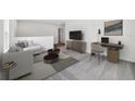 Bright loft space with a couch, desk, and large TV at 33239 Country House Dr, Sorrento, FL 32776