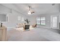 Bright living room with a view of backyard access at 1042 Twisted Branch Ln, St Cloud, FL 34771