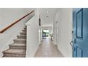 Bright and spacious entryway with staircase at 3663 Circle Hook St, Kissimmee, FL 34746