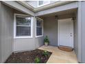 Front door entry with sidelights and landscaping at 631 Laurel Oak Ln # 113, Altamonte Springs, FL 32701