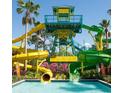 Waterpark with slides and a large pool at 14501 Grove Resort Ave # 3134, Winter Garden, FL 34787