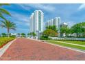 Luxury high rise building with water views and brick paved road at 231 Riverside Drive # 1209-1, Holly Hill, FL 32117