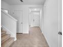 Bright and airy foyer with tile floors and neutral tones at 3872 Rory Oak Cir, Apopka, FL 32703