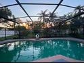 Relaxing screened pool area with sunset view at 1046 Shinnecock Hills Dr, Oviedo, FL 32765