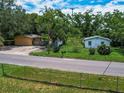 Aerial view of property with two buildings at 1129 Crestview Ave, Lakeland, FL 33805
