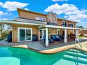 Enjoy this expansive pool and patio area at 102 Via Duomo, New Smyrna Beach, FL 32169