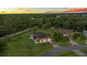 House with pool and shed on a large lot with mature trees at 636 Koala Ct, Poinciana, FL 34759