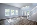 Bright living room with hardwood floors and neutral walls at 1301 Kintla Rd, Apopka, FL 32712