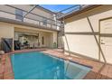 Private pool and patio area with outdoor dining furniture at 1987 Majorca Dr, Kissimmee, FL 34747