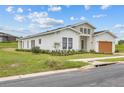 Modern two-story home with attached garage at 197 Valencia Ridge Dr, Auburndale, FL 33823