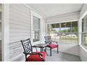 Cozy front porch with seating, perfect for relaxing at 1700 Minnesota Ave, St Cloud, FL 34769