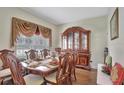 Formal dining room with hardwood floors and a large china cabinet at 1383 Alston Bay Blvd, Apopka, FL 32703