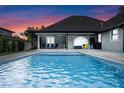 Inviting swimming pool with a spacious patio area at 1451 Lyndale Blvd, Winter Park, FL 32789