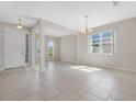 Spacious living room with tile floors and lots of natural light at 4814 Terra Sole Pl, St Cloud, FL 34771