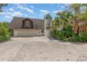 Long driveway with a basketball court and ample parking space at 5006 Cub Lake Dr, Apopka, FL 32703