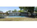 Newly built home with a refreshing pool and a spacious backyard at 1801 James St, South Daytona, FL 32119