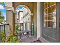 Inviting entryway with a tiled porch and bench at 801 Lobelia Dr, Lake Mary, FL 32746