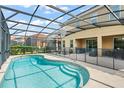 Inviting screened pool with patio furniture at 5229 Oakbourne Ave, Davenport, FL 33837