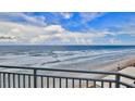 Stunning ocean view from private balcony, featuring expansive beach and waves at 5207 S Atlantic Ave # 1226, New Smyrna Beach, FL 32169