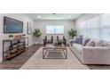 Modern living room featuring hardwood floors and stylish furniture at 905 Marabon Ave, Orlando, FL 32806