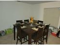 Casual dining area with table and chairs for six at 15507 Willet Ct, Mascotte, FL 34753