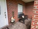 Front porch with a bench and fall decor at 2727 N Juliet Dr, Deltona, FL 32738