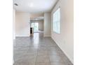 Bright living room with tile floors at 2222 Elmsford Pt, Sanford, FL 32771
