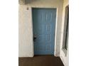 Condo front door entry with keyless entry pad at 954 Courtyard Ln # 11, Orlando, FL 32825