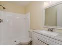 Updated bathroom with white tile and modern vanity at 4806 S Semoran Blvd # 201, Orlando, FL 32822