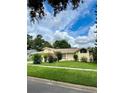 Single story house with mature landscaping at 836 Rosemere Cir, Orlando, FL 32835