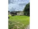 Single story house with screened patio at 836 Rosemere Cir, Orlando, FL 32835