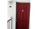 Red front door of a condo unit at 11544 Westwood Blvd # 1325, Orlando, FL 32821