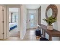 Home entry with view into living and bedroom areas at 7163 Painted Bunting Way, St Cloud, FL 34773
