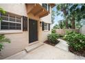 Front entrance with walkway and lush landscaping at 2422 Kilgore St # 30, Orlando, FL 32803