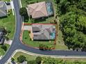 Aerial view showcasing home's size and backyard at 143 Brunswick Dr, Davenport, FL 33837