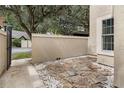Stone patio and walkway leading to the home's entrance at 1473 Farrindon Cir, Lake Mary, FL 32746