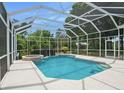 Relaxing screened-in pool area at 6659 Crenshaw Dr, Orlando, FL 32835