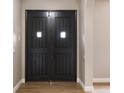 Elegant entryway with double doors and wood flooring at 18645 Seaview St, Orlando, FL 32833