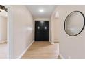 Bright entryway with double doors and wood flooring at 18645 Seaview St, Orlando, FL 32833