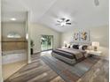 Main bedroom with ensuite bath and sliding glass doors leading to the backyard at 862 N 4Th Ave, Deltona, FL 32725