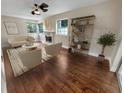 Living Room with fireplace and hardwood floors at 910 Alameda Dr, Longwood, FL 32750